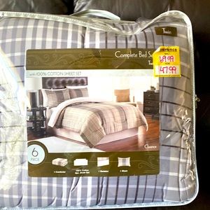 6 piece Twin Comforter set- new.  Machine washable.